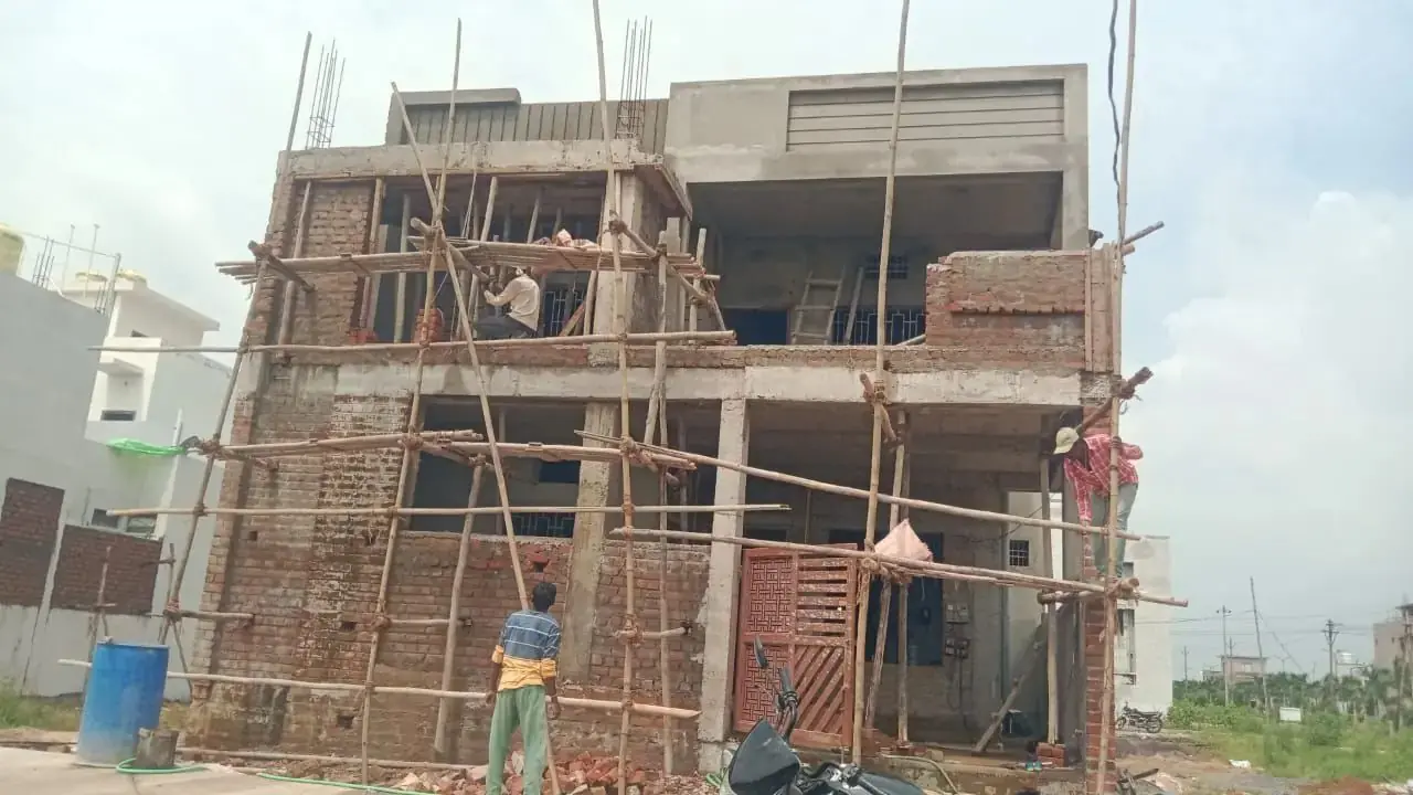 Home under construction with scaffolding, Raipur